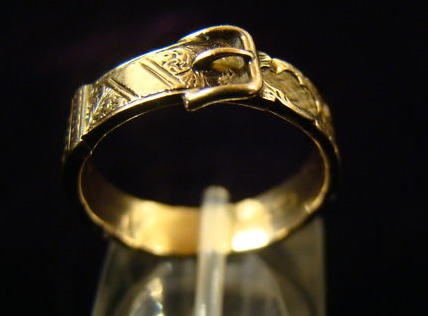 belt / buckle in jewellery symbolism