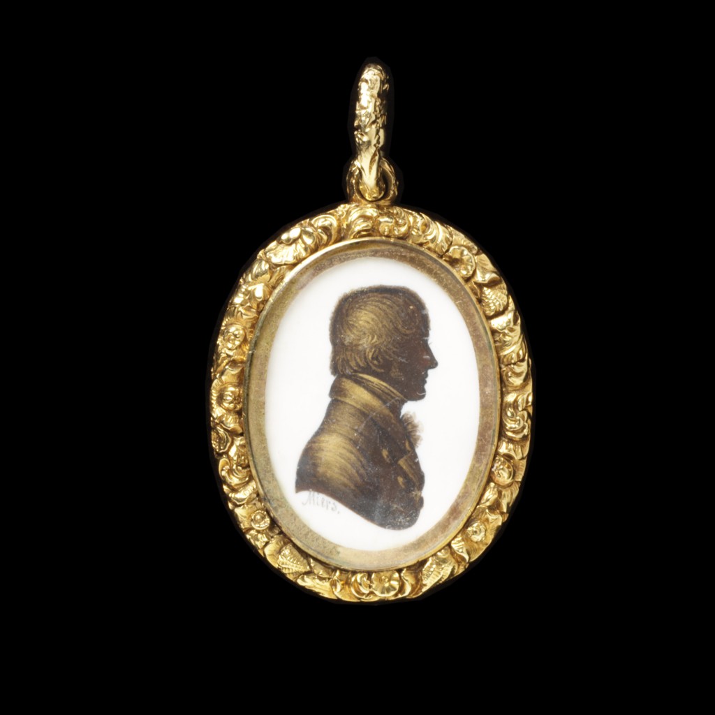 Gold, cast and chased shellwork and floral frame enclosing a silhouette of a gentleman painted in watercolour on ivory by John Miers; mounted on the reverse with a curl of hair bound with gold thread and pearls.