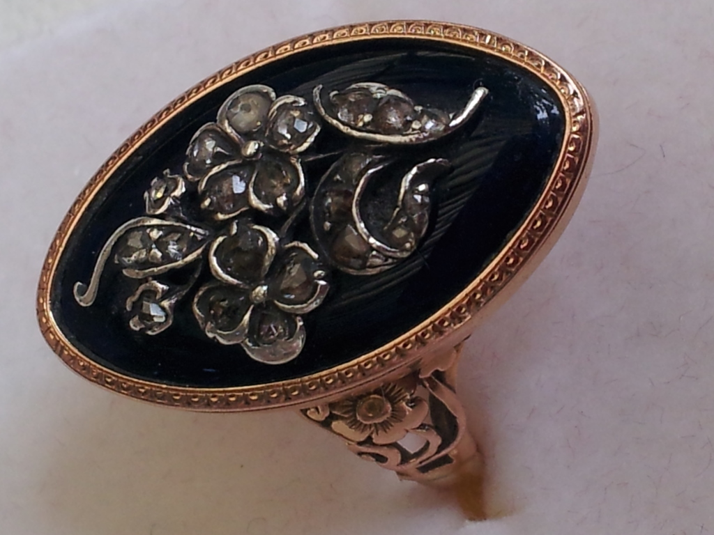 Forget-me-not and rose ring, with blue enamel, and diamond. Image courtesy of Julie Strawinski.