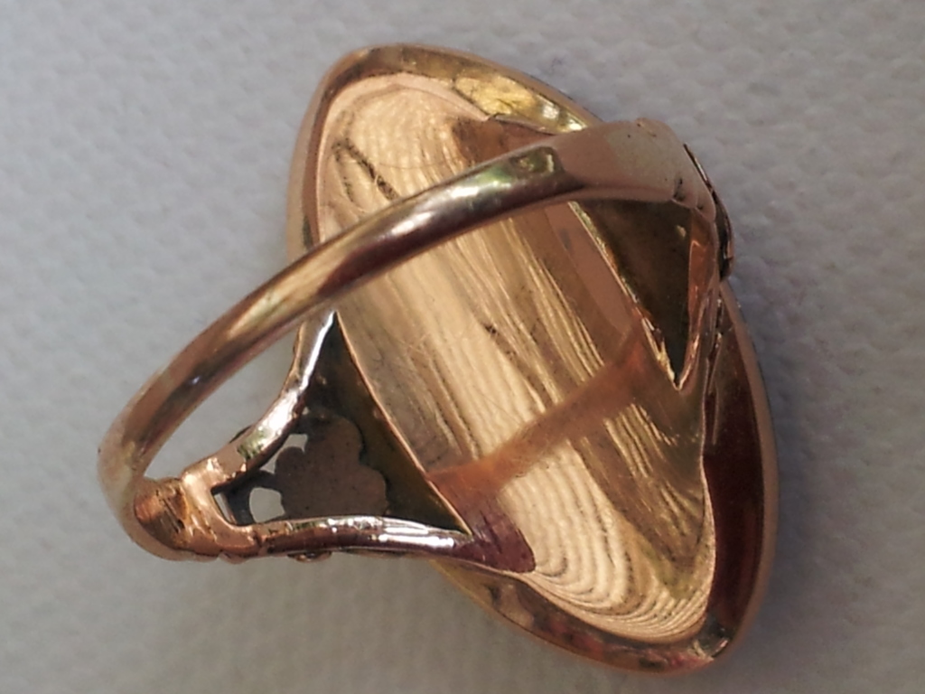 Forget-me-not and rose ring, with blue enamel, and diamond. Image courtesy of Julie Strawinski.