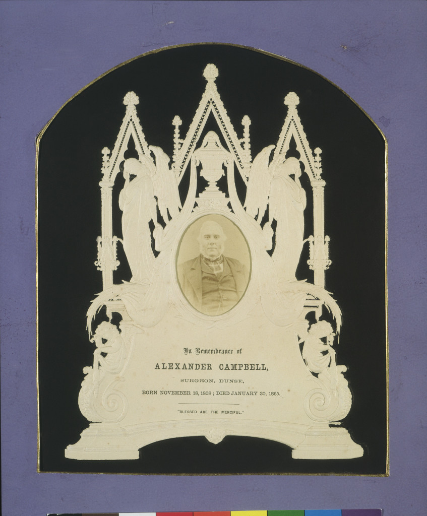 Photograph, on blind-embossed cream card with letterpress and black painted background, the top mount painted purple with gold-edged window. Image courtesy of the V&A Museum.