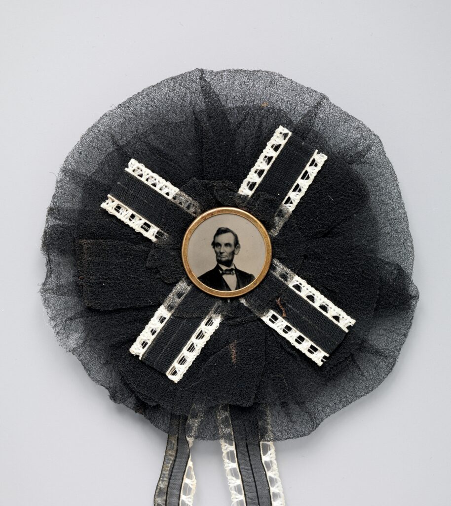 Abraham Lincoln memorial ribbon with photograph. Image courtesy of MET Museum.
