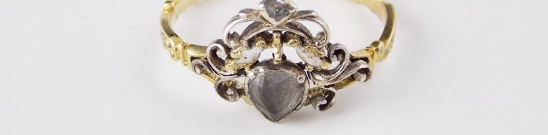 Mourning ring R:R:OB 28 May 1727 AE:23. White enamel, Rococo ribbon band, doves and Georgian heart.