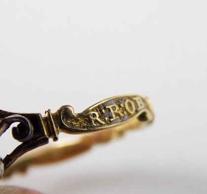 Mourning ring R:R:OB 28 May 1727 AE:23. White enamel, Rococo ribbon band, doves and Georgian heart.