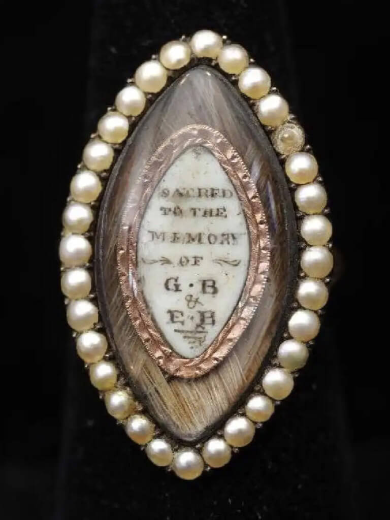 Mourning ring with dedication; “Sacred to the memory of E.B & G.B” Reverse: “Reverend G. Bally Rector of Monxton O.B Jan 18 1779 A.E 59”.