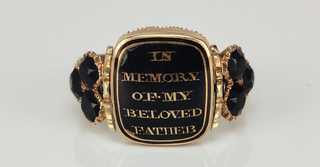 Black enamel swivel mourning ring reading "R.P Alywin OB 24th May 1816 AE 54 / IN MEMORY OF MY BELOVED FATHER” – later research has identified him as Robert Patrick Alywin. Courtesy Kalmar Antiques.