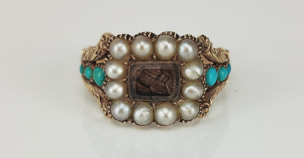 c.1810-1820 sentimental ring with pearl and turquoise showing the emergence of the Gothic Revival style. Courtesy Kalmar Antiques