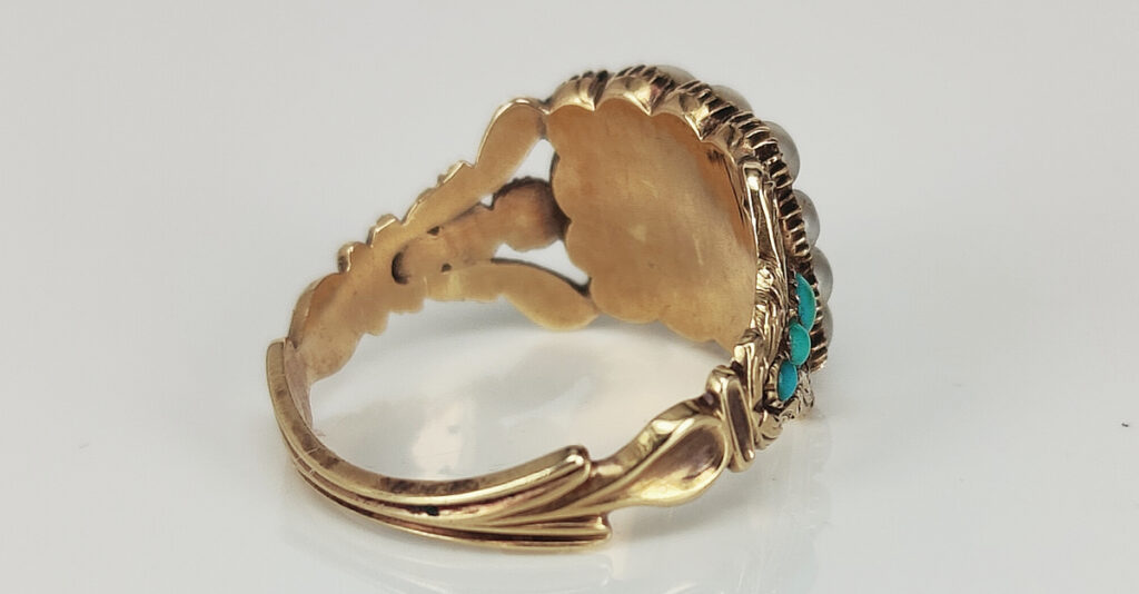 c.1810-1820 sentimental ring with pearl and turquoise showing the emergence of the Gothic Revival style. Courtesy Kalmar Antiques