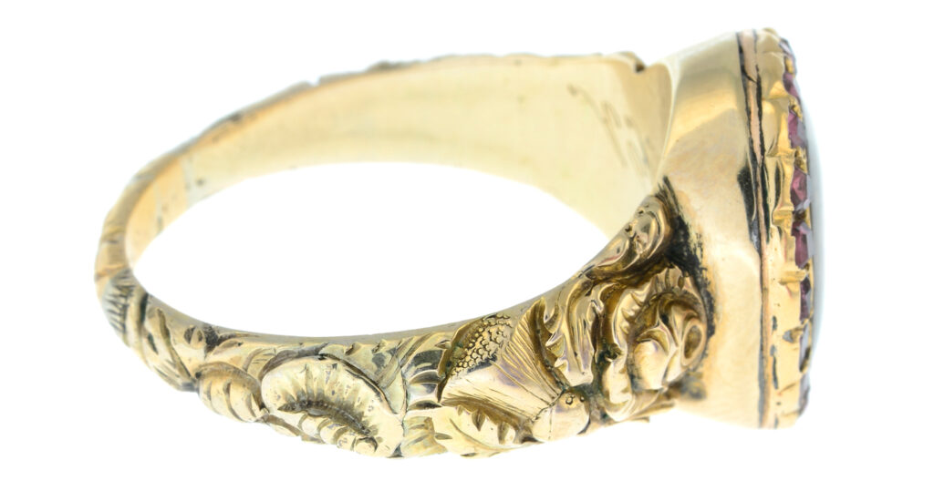 Side of c.1820 George III mourning ring showing acanthus and rose band.